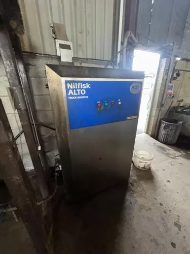 Nilfisk SH Truck Booster pressure washer after full service and internal pump overhaul, restored to smooth and reliable operation.